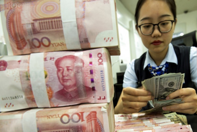 中国央行旗下媒体撰文，分析人民币贬值的“四大因素”